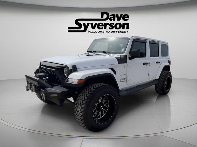 2018 Jeep Wrangler Unlimited Sahara in Bright White Clearcoat — front three-quarter view